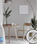 No Sweat Easy Patch Wall Repair Access Panel Instantly Conceals Drywall Holes Up To 7 5 Inches in a cozy living room setting.