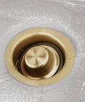 Top view of Universal Three And One Half Inch Kitchen Sink Flange And Stopper Kit For Garbage Disposals Champagne Bronze Stainless Steel