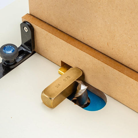 Close-up of Box Joint Router Jig With Precision Indexing For Router Table, showing 3/4 brass indexing key and MDF base.