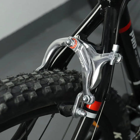 Close-up of Front And Rear C Type Bike Brake Calipers Set All In One With Levers And Inner And Outer Cables for mountain bikes, silver.