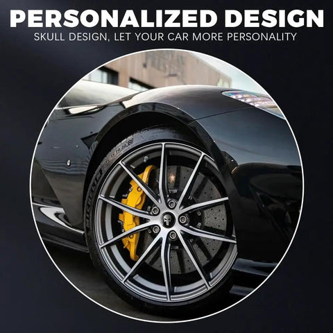 Premium Skull Wheel Center Caps 4 Pack Universal 2.2 Inch Aluminum Hub Covers on a car wheel with yellow brake caliper.