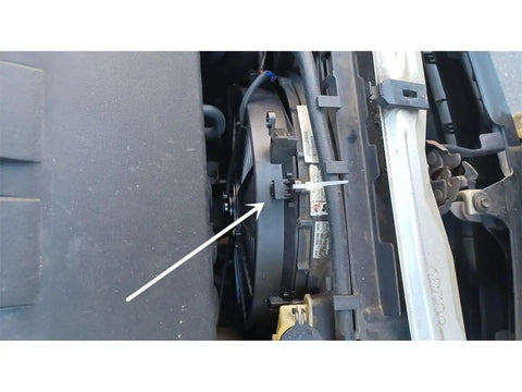 Universal Electric Radiator Fan Mounting Kit 8 Pieces L Shape Bracket Feet Tabs installed on a vehicle radiator