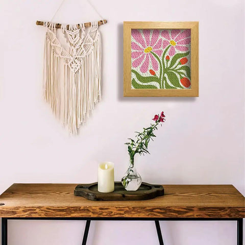 Flower Punch Needle Kit For Beginners Easy Embroidery Starter Set with floral design in square frame displayed on a wall