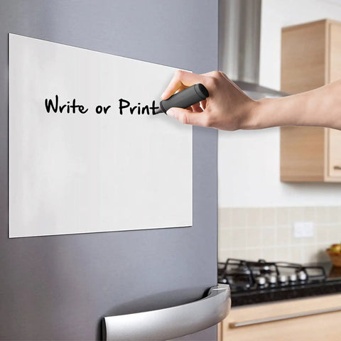 Person writing on Durable White Vinyl Magnetic Roll for DIY Crafts, Super Strong, Inkjet Printable, 24 by 120 Inch, 30 Mil Thick