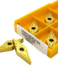 Premium Carbide Turning Inserts 10 Pack Vnmg160408 And Vnmg160404 displayed in yellow case, showing gold-colored inserts for CNC lathes.