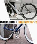 Adjustable Aluminum Bike Kickstand Center Mount For 24 To 29 Inch Mountain, Road, BMX And MTB Bikes on parked bicycle.