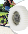 Electric Bike Hub Motor Planetary Gear Replacement Kit 36T with Bearings close-up next to an e-bike on path.