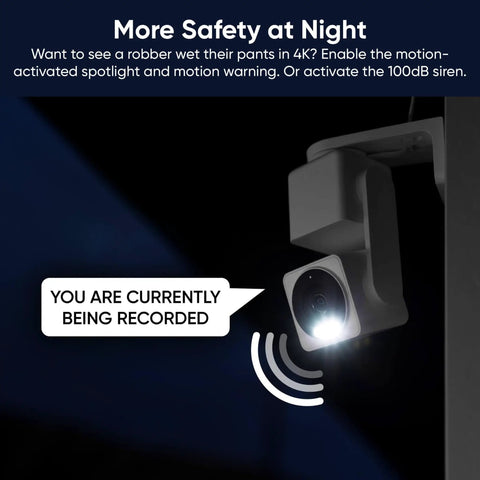 4K Pan Tilt Security Camera With Color Night Vision For Indoor And Outdoor Use, mounted with spotlight on in darkness