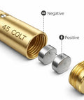 Top Tier.45 Colt And 12 Gauge Shotgun Laser Bore Sighter Cartridge with battery components and engraved markings.
