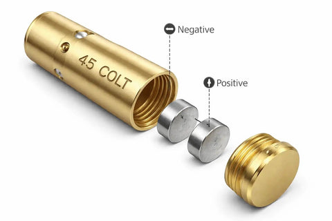 Top Tier.45 Colt And 12 Gauge Shotgun Laser Bore Sighter Cartridge with battery components and engraved markings.