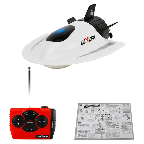 Mini RC Submarine Boat Remote Control Waterproof Diving Toy With Rechargeable Battery, controller, and manual