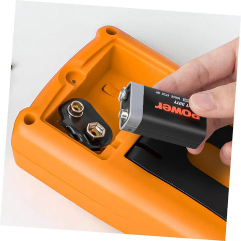 Inserting battery into Dm850 Auto Range Digital Multimeter Handy Handheld Voltage Current Tester With Resistance Diode Continuity For Diy Home Repair And Everyday Electronics Projects