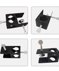 Heavy Duty Deck Torch Clamp Set Black Metal Rail Mounts For Outdoor Torches Universal Porch Rail Clamp Accessory Weatherproof Galvanized Steel Anti Rust Two Pack Fits Railings And Poles For Easy Deck Lighting, showing black metal clamps with screws on a white background.