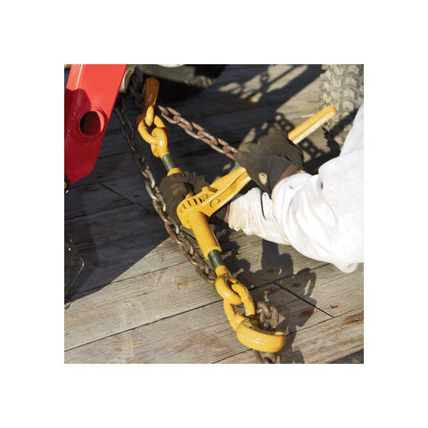 Heavy Duty Ratchet Load Binder For 3/8 To 1/2 Inch Grade 70 Transport Chain, yellow, attached to chain on a wooden deck.