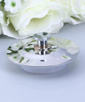 Stainless Steel Bathtub Stopper for 40-45mm Drain Holes resting on a surface, featuring a shiny surface and sturdy design.