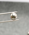 Stainless Steel Bearing Balls Kit With 15 Sizes Ranging From 3 To 25 Millimeters And Inch Sizes From One Eighth To One Half Inch Precision Balls 2 To 100 Pieces Durable Rust Resistant For Bearings Machinery And Gearhead Friendly DIY Projects, polished steel ball held with tweezers