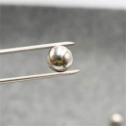 Stainless Steel Bearing Balls Kit With 15 Sizes Ranging From 3 To 25 Millimeters And Inch Sizes From One Eighth To One Half Inch Precision Balls 2 To 100 Pieces Durable Rust Resistant For Bearings Machinery And Gearhead Friendly DIY Projects, polished steel ball held with tweezers