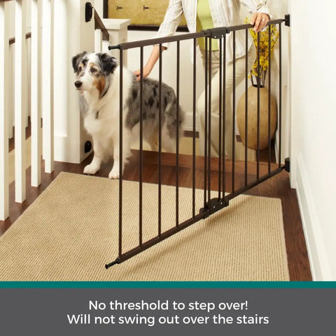 Bulletproof Hardware Mounted Walk Thru Pet Gate 31 Inches Tall Fits 28 To 48 Inch Doorways with a dog by the stairs.