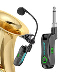 Two Point Four G Wireless Clip On Saxophone And Brass Instrument Microphone System attached to saxophone bell