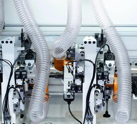 Heavy Duty Dust Collection Hose 2 By 10 Ft Thick Wall Pvc Suction Tube With Twist Lock Clamps connected to machinery.