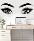 Motivational Eyelashes And Eyes Wall Decal With Crown And Butterflies For Women And Girls Inspirational Quote Wall Art For Bedroom And Living Room Boss Babe Vibe Positive Sticker on a white wall above a desk.