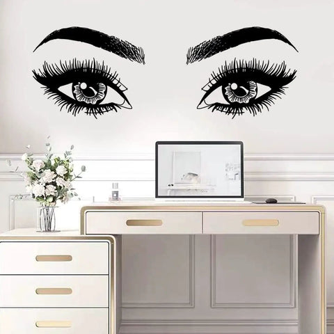 Motivational Eyelashes And Eyes Wall Decal With Crown And Butterflies For Women And Girls Inspirational Quote Wall Art For Bedroom And Living Room Boss Babe Vibe Positive Sticker on a white wall above a desk.