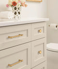 Champagne Bronze Destine Cabinet Pull 5-1/16 Inch Center-To-Center on bathroom drawers in modern setting