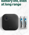 Top Tier Wireless Outdoor Security Kit With Four Super Clear Cameras Plus A 2K Battery Video Doorbell showing black camera and Energizer batteries.