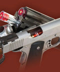 Shotgun Snap Caps 12 Gauge With False Primer Reusable Dry Fire Practice Aids in gun chamber and breech view.