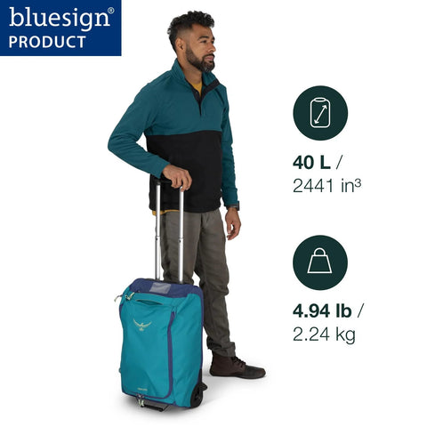 Man using 40L collapsible wheeled carry on duffel with backpack straps, lightweight travel solution, bluesign product, teal and blue design.