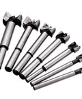Seven-piece woodworking drill bit set, 6–25 mm, silver metal, angled side view