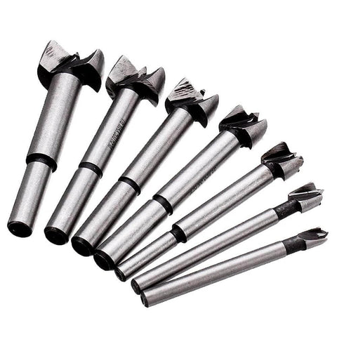 Seven-piece woodworking drill bit set, 6–25 mm, silver metal, angled side view