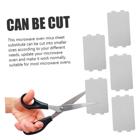 Scissors cutting Twenty Pack Microwave Mica Plate Sheets Easy DIY Repair Heat Resistant Insulation For Ovens