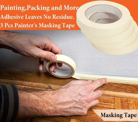 Close-up of hand applying painter's masking tape on a wall, ideal for zero prep paint jobs.