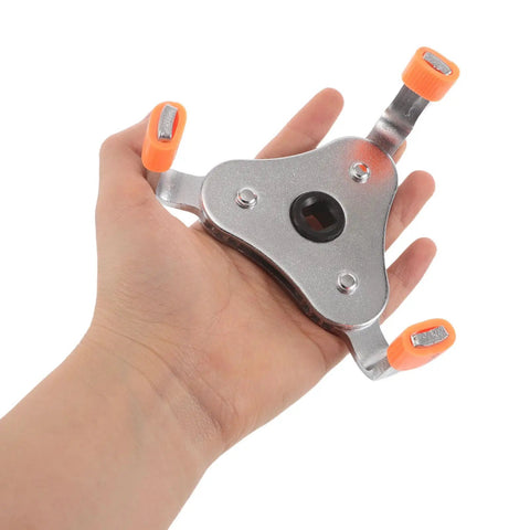 Top Shelf Smoke Detector Removal Tool For Ceiling Sensors Hassle Free Disassembly Grip in hand, orange grip, metal tool design.