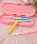 Next Level Cookie Scribe Needles For Home Bakers, 5.2 Inch Precision Icing Art Pins in a pink case with comfy grips.
