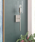 Brushed Nickel Wall Sconces Set Of 2 Sleek Modern Industrial Vanity Lights with Clear Glass Shades for bathroom wall lighting.