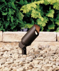 Accent 1-Light 12V MR11 Spotlight in Textured Architectural Bronze, Wet Location Rated With Heat-Resistant Clear Flat Glass on stones