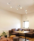 Living room with Six Light LED Track Lighting Kit, matte nickel finish, ceiling mounted, showing rotatable heads.