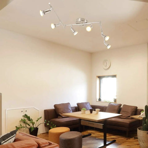 Living room with Six Light LED Track Lighting Kit, matte nickel finish, ceiling mounted, showing rotatable heads.