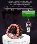 JAYEGT 22lbs Motorized Rotating Turntable Display Stand showcasing jewelry and pinecone, demonstrating quiet performance with sound measurement.