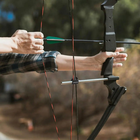 Close-up of archer holding bow with Archery Compound Bow Cable Slide Block Replacement Accessory Durable Plastic Bowstring Separator