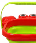 Close-up of red and green foldable bucket from Foldable Bucket And Shovel Tools Kit For Kids Sand Toys With Animal Design Five Piece Travel Beach Set