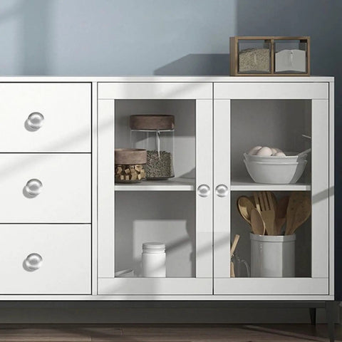 White cabinet with glass doors, wooden shelves, and decorative items, featuring stainless steel cabinet door handles set of 4 with hidden buckle.