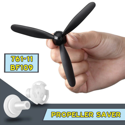 Hand holding RC plane propeller from Three Sets Spare RC Plane Propellers 3 Blade Pack Compatible With 76111 BF109 Remote Control Airplane.