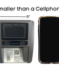 Effortlessly Verify Legit Greenbacks On The Go With This Hella Fast Portable Counterfeit Detector Machine, size comparison with smartphone.