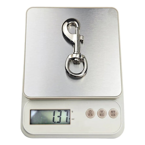 3.2 Inch Swivel Snap Hooks 2 Pack Stainless Steel Trigger Clips displayed on digital scale