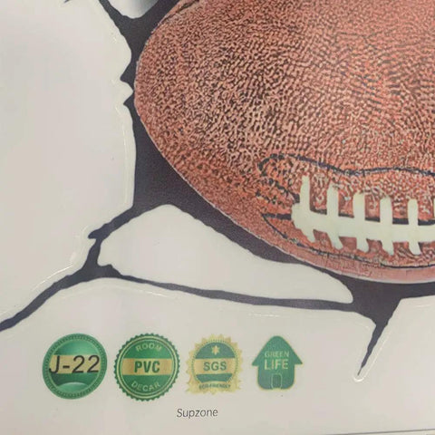 Close-up of 3D Dope Sport Ball Wall Stickers Break Through Kit featuring a football bursting through wall, eco-friendly vinyl material.