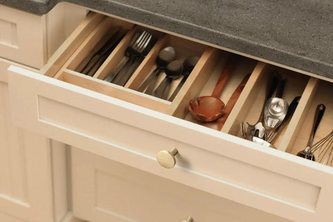 Champagne Bronze Kitchen Cabinet Knobs 6 Pack Round Modern Hardware For Cabinets And Dressers One And One Eighth Inch Diameter Fingerprint Resistant Brushed Finish Easy Install Chic Minimalist Look For Any Room on a kitchen drawer with utensils.