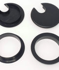 Heavy Duty Desk Grommet Covers For 2.5 Inch Cutouts Slick Black Plastic Cable Management Kit With Five Pieces showing four grommet designs.